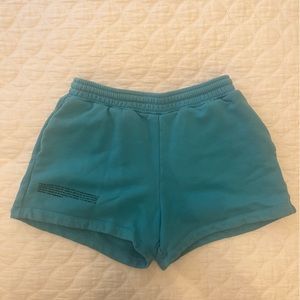 Pangaia sweat shorts in blue. Size xs